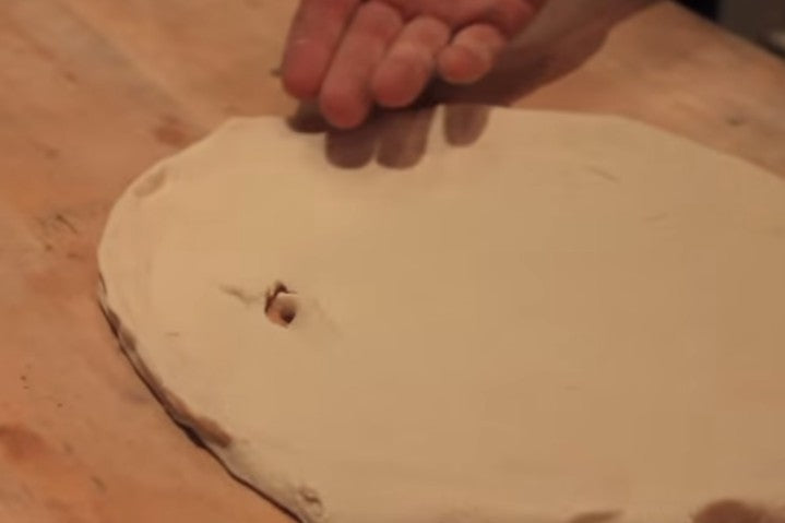 How to repair a hole in your pizza dough